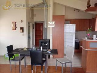 Άποψη ορόφου,κουζίνα ,τραπεζαρία ,είσοδος,σόμπα