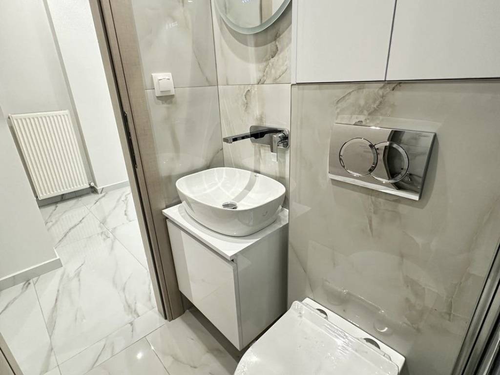 Forumland Real Estate, Μπάνιο