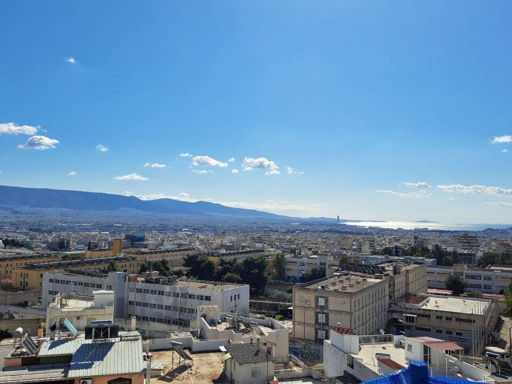 ορίζοντας με θέα θάλασσα από τον ανοικτό εξώστη του ε΄ ορόφο