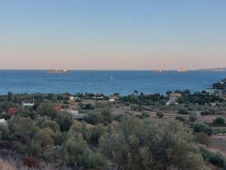 View from the plot: Aegina island -&gt; right and Piraeus-&gt;left