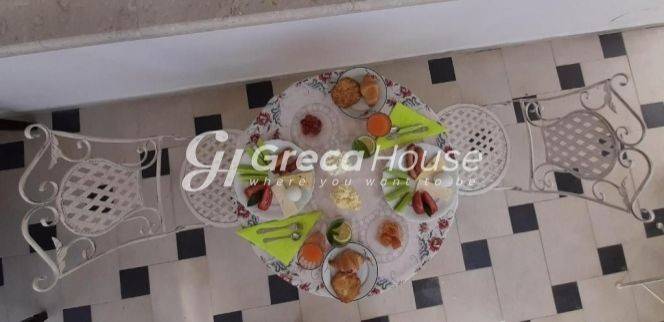 Guesthouse with 11 apartments for sale in Louraki