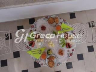 Guesthouse with 11 apartments for sale in Louraki