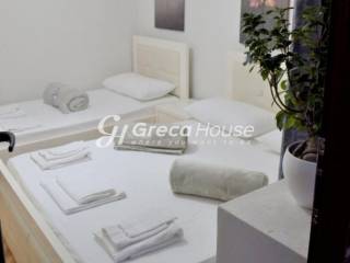 Guesthouse with 11 apartments for sale in Louraki