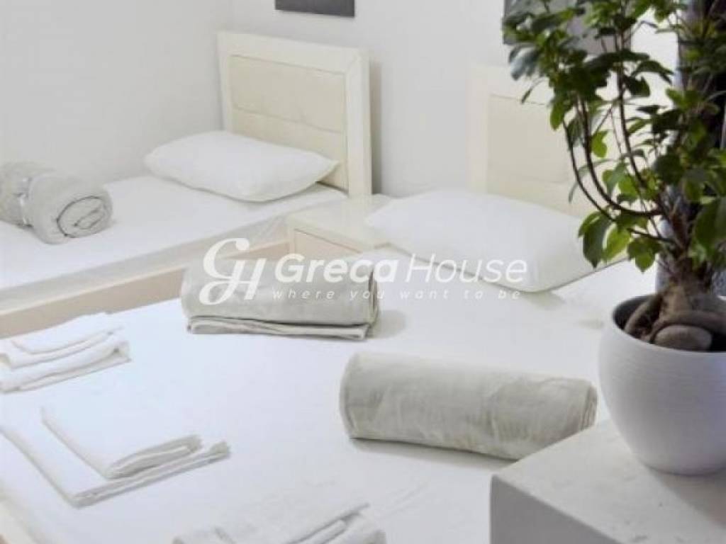 Guesthouse with 11 apartments for sale in Louraki